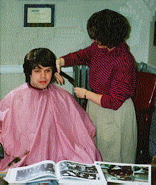 Stella giving Chris a haircut